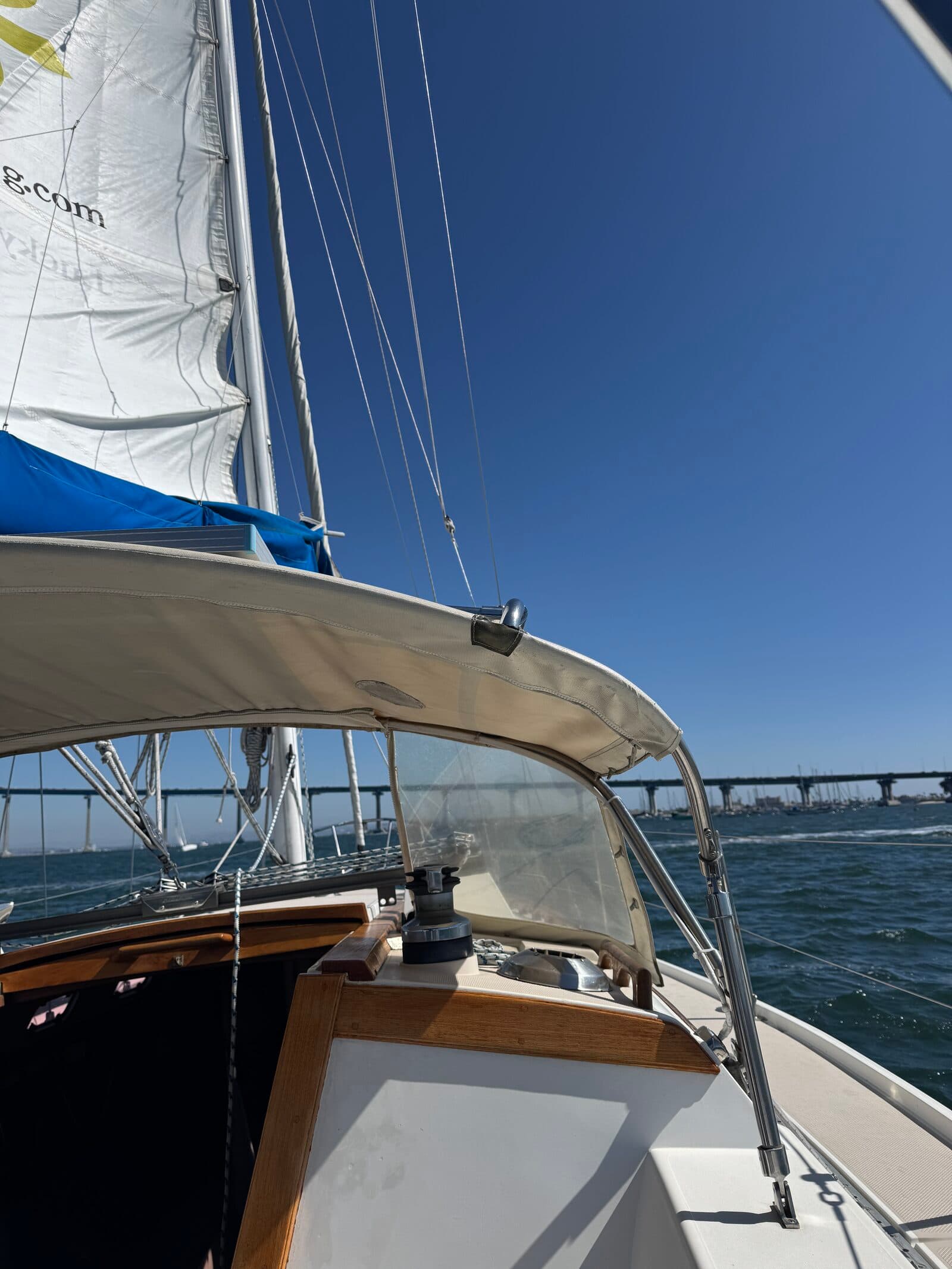 On deck under sail approaching the Coronado Bridge